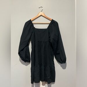 Black dress; short, off shoulders, cottage core.